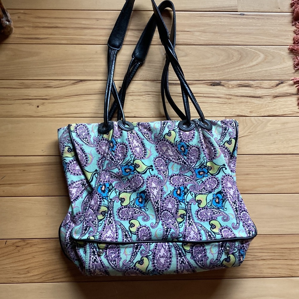 Brand new Paisley Fabric handbag with leather straps lots of zippers